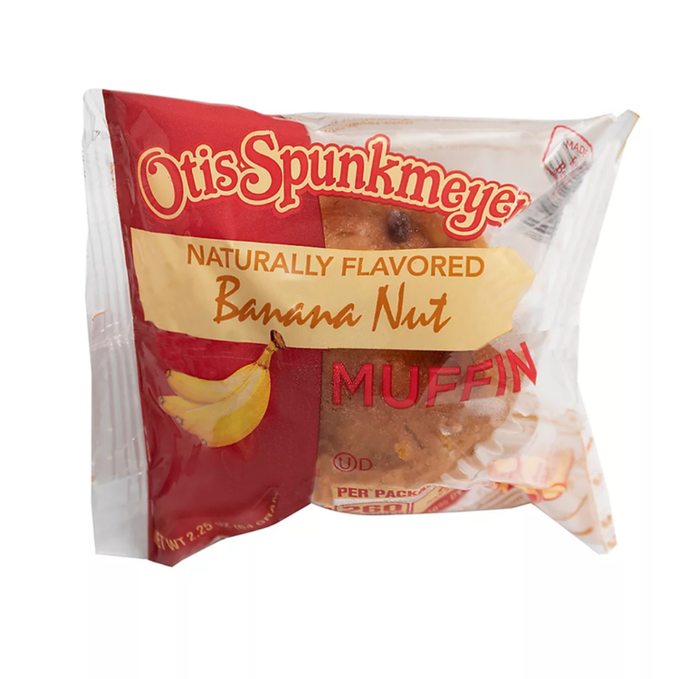 Banana nut muffin by Otis Spunkmeyer, 2.2oz, with visible banana and nut pieces, packaged for freshness.