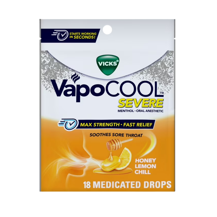 Vicks VapoCOOL Honey medicated drops in a clear plastic container, showing the honey-flavored lozenges for sore throat relief.