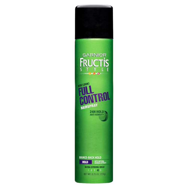 Garnier Fructis Style Full Control Anti-Humidity Hairspray bottle, 8.25 oz, with a spray nozzle and product label visible.