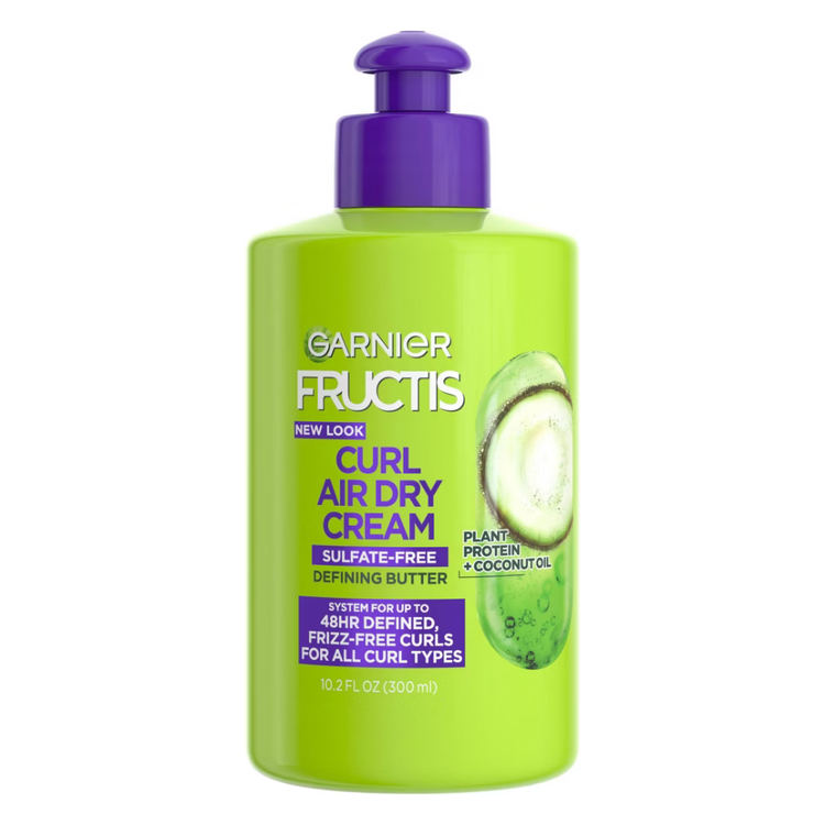 Garnier Fructis Curl Air Dry Cream in 10.2 fl oz bottle, for curly hair, shown in a natural setting.