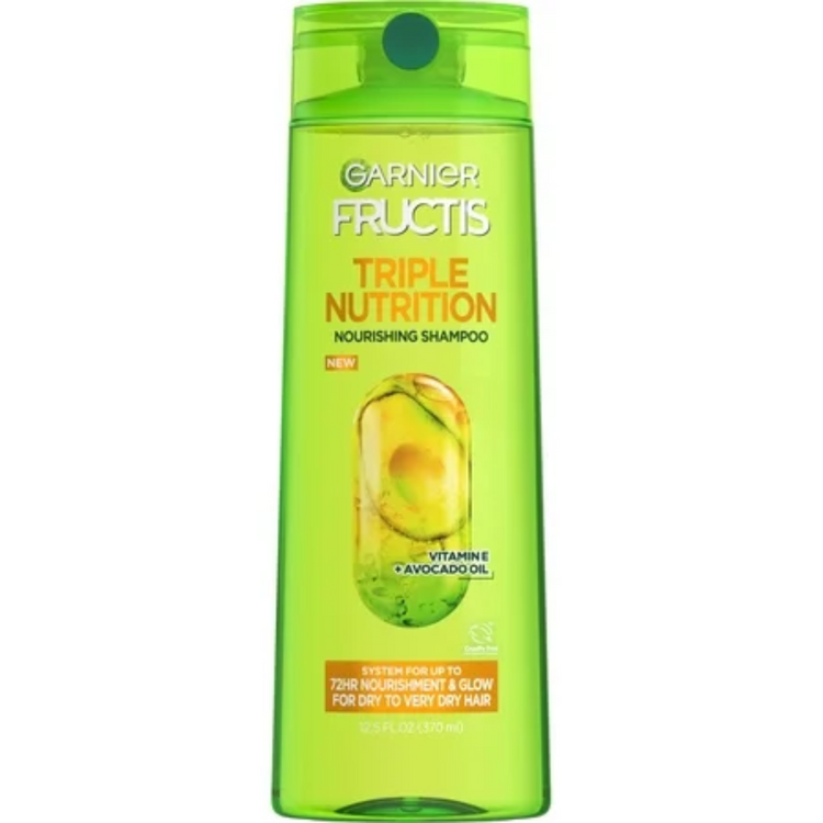 Garnier Fructis Triple Nutrition Fortifying Shampoo 12.5 oz bottle, showing the label and product packaging.