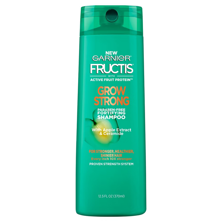 Garnier Fructis Grow Strong fortifying shampoo bottle, 12.5 oz, with green label and pump dispenser, on a white background.
