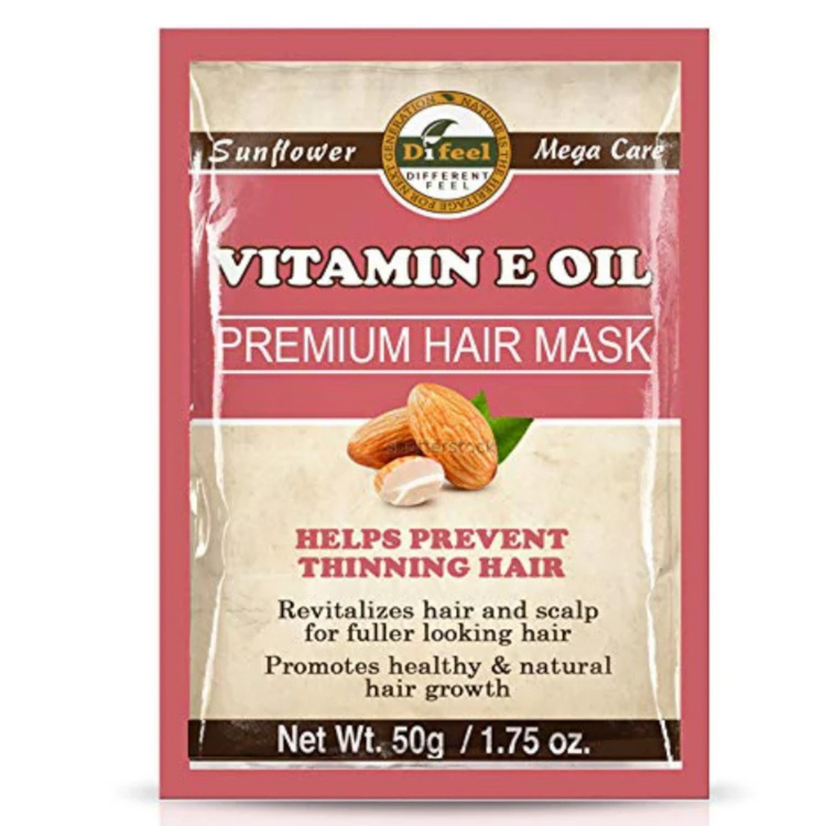 Difeel Vitamin E Oil Premium Hair Mask in a 1.75oz jar, featuring vibrant packaging and a smooth, creamy texture for hair care.