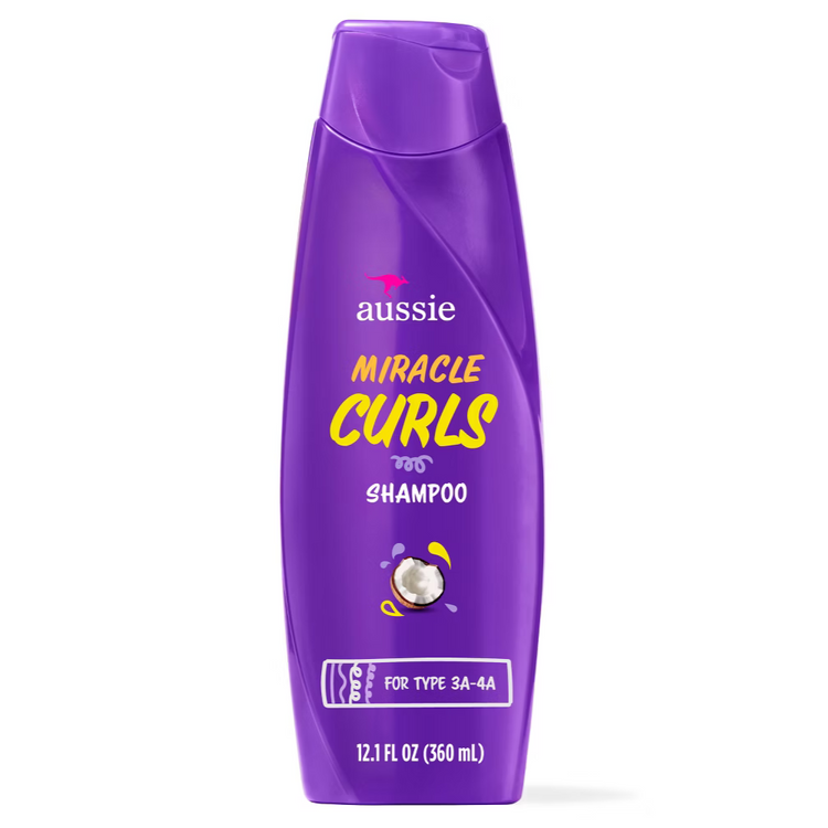 Aussie Miracle Moist shampoo and conditioner set with 12.1 oz bottles, designed for nourishing and hydrating hair.