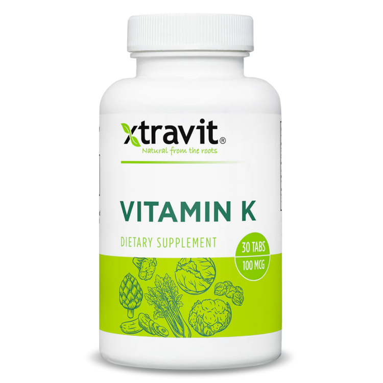 Xtravit Vitamin K capsules in a bottle, dietary supplement, 30-count, with label showing product name and branding.
