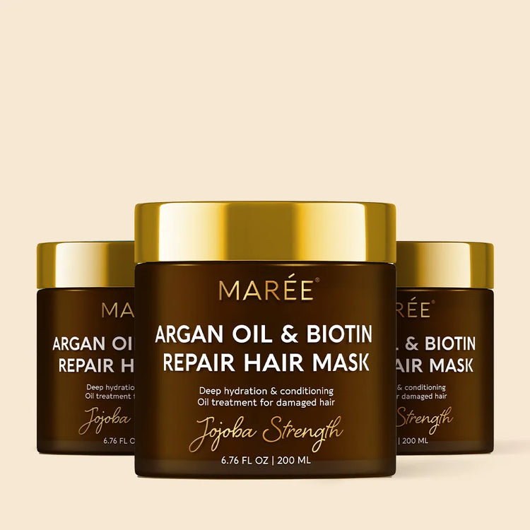 Maree Argan Oil and Biotin Hair Repair Mask in a jar, showing the creamy hair treatment with natural ingredients for damaged hair.