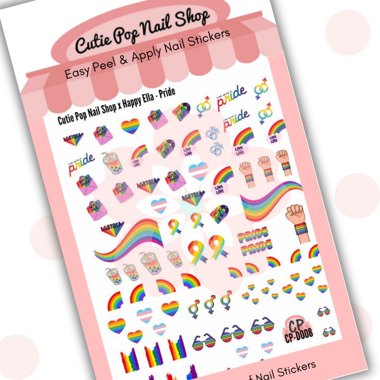 Colorful Pride-themed nail art set from Cutie Pop Nail Shop featuring vibrant nail polish designs for celebration.