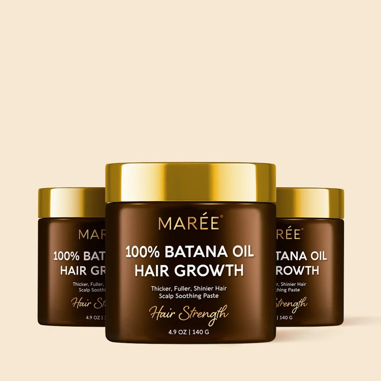 Natural batana hair growth paste by Maree, showing the creamy herbal product in a jar with a smooth texture.