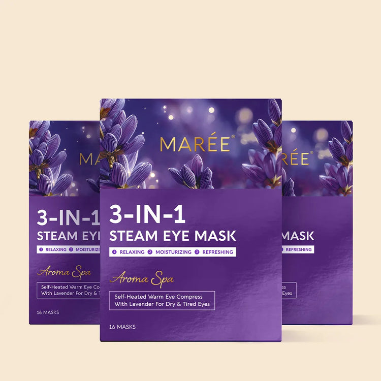 Maree Scented Spa Steam Eye Mask lying flat with soft fabric and packaging in the background, designed for relaxing eye comfort.