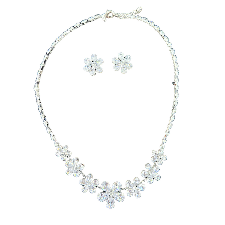 Elegant floral crystal jewelry set with matching necklace and earrings, featuring sparkling crystals and intricate floral designs.