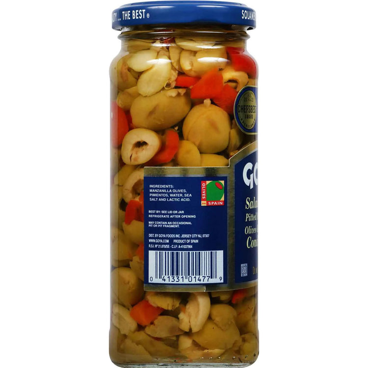 Sliced salad olives with red peppers in a jar, Goya brand, 7 oz, ready to add flavor to salads and dishes.