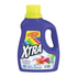 XTRA Tropical Passion liquid laundry detergent in a 57.6oz bottle, featuring vibrant tropical fruit imagery and bright packaging.