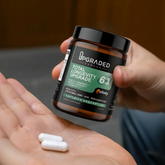 Upgraded Formulas® Total Longevity Upgrade supplement bottle with tablets, promoting overall health and wellness.