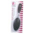 FreeStyle oval cushion brush for hair by Farmacias Savia, showing a close-up of the oval-shaped hairbrush with soft bristles.