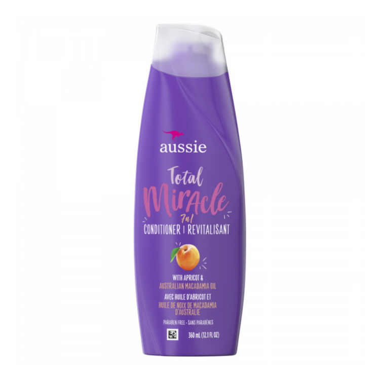 Aussie Total Miracle 7-in-1 Conditioner with Macadamia Oil in a 12.1 oz bottle, featuring vibrant packaging and product label.
