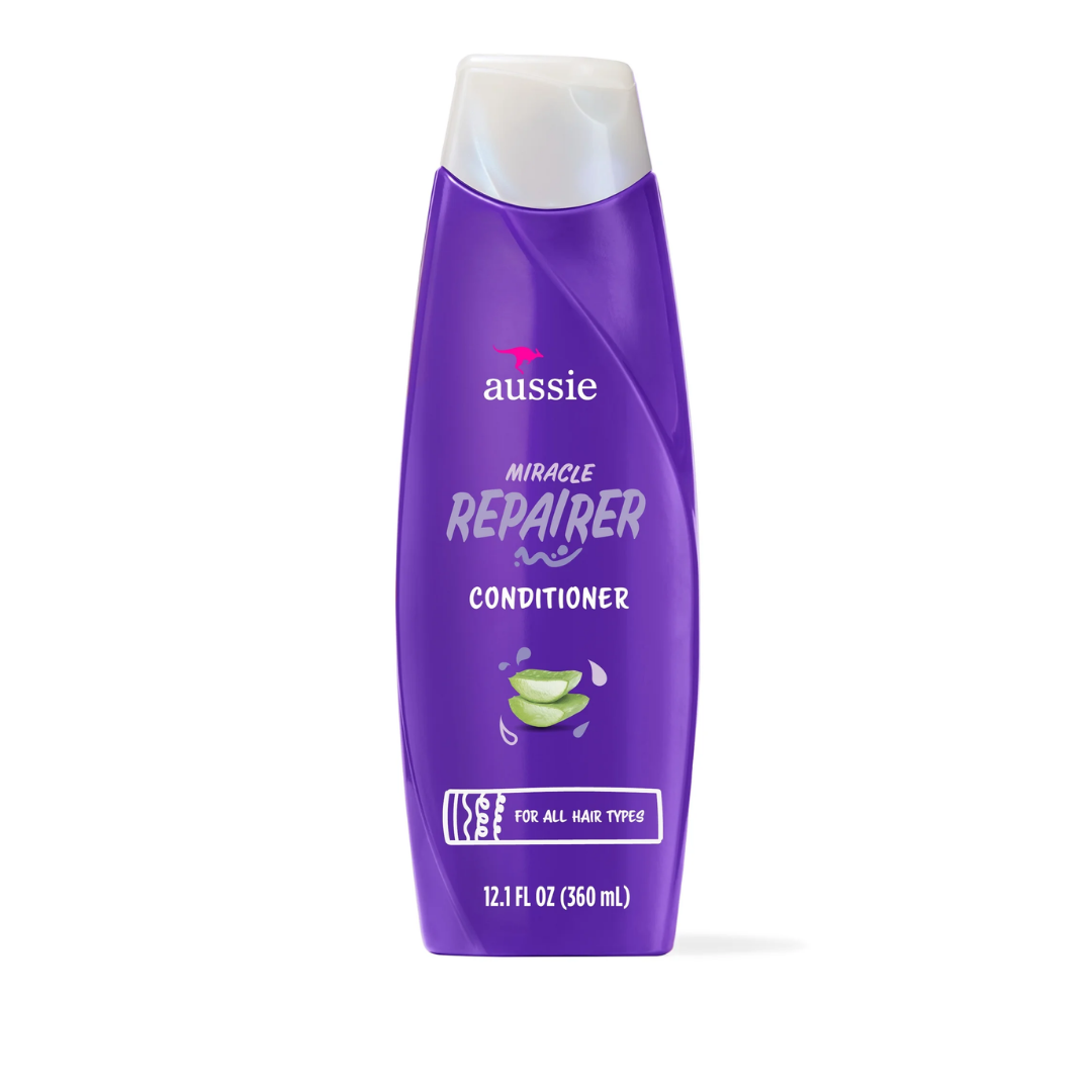 Aussie Miracle Repairer Conditioner with Aloe in 12.1oz bottle, showing the conditioner bottle with vibrant label and product branding.