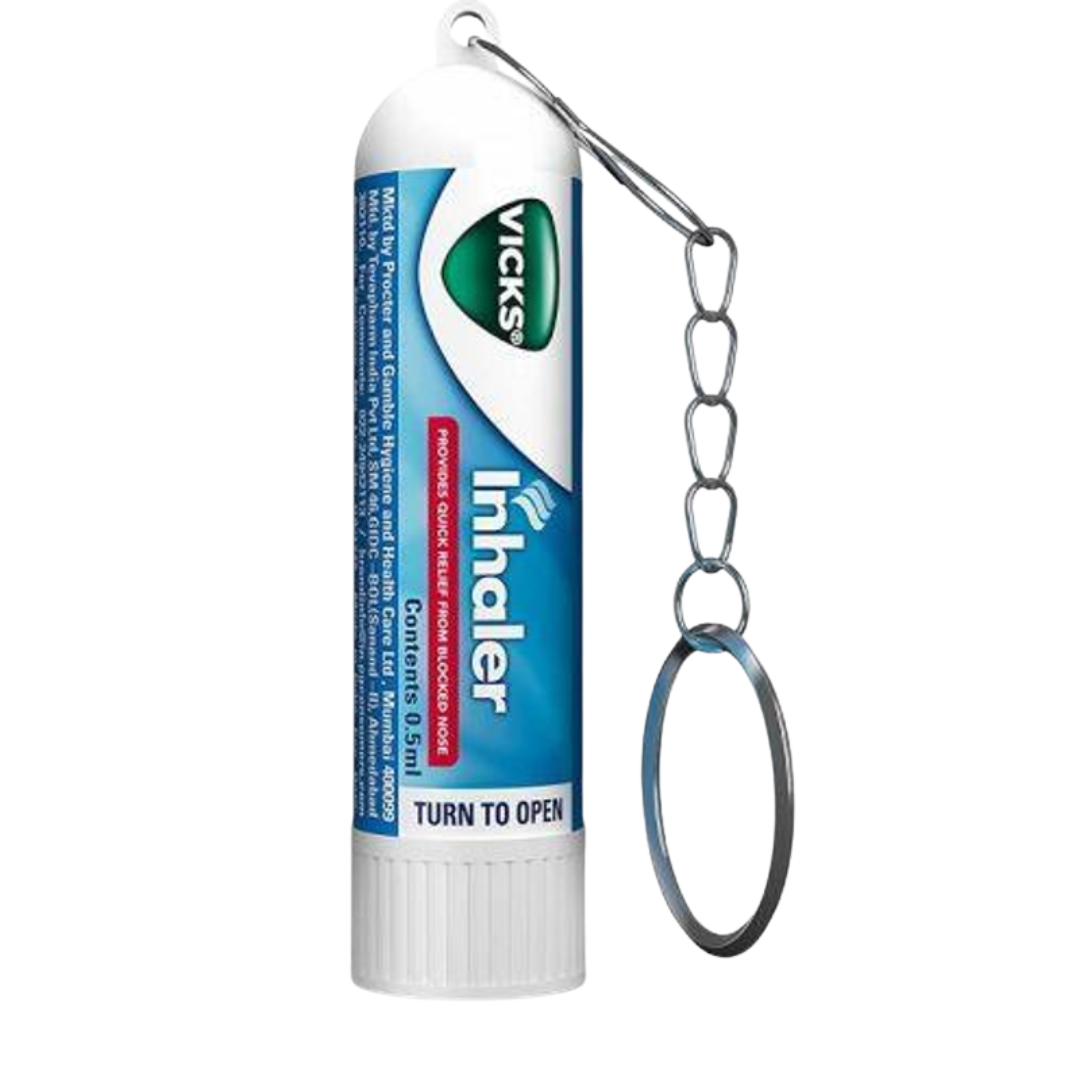 Farmacias Savia Vicks nasal inhaler keychain with 0.5ml relief for blocked nose, compact and portable for quick use.