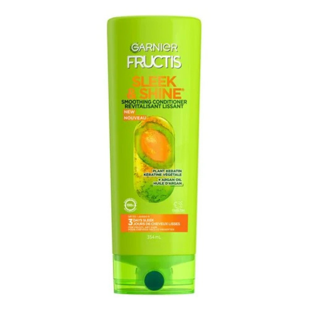 Garnier Fructis Sleek & Shine smoothing conditioner for hair, 12 oz bottle with sleek packaging and product label visible.