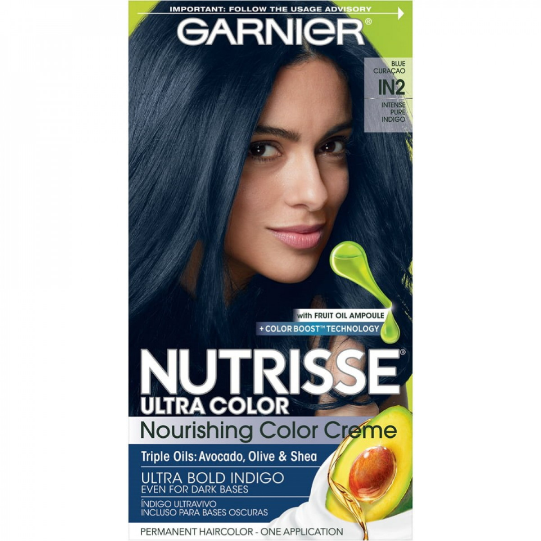 Garnier Nutrisse Ultra Color Intense Pure Indigo hair dye tube, 3.4oz, featuring deep blue shade for vibrant hair coloring.