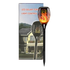 LED solar torch light from Farmacias Savia illuminating outdoor garden with a tall, flickering flame design.