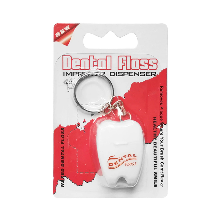 Waxed dental floss keychain in tooth shape with keyring, portable dental hygiene accessory from Farmacias Savia.