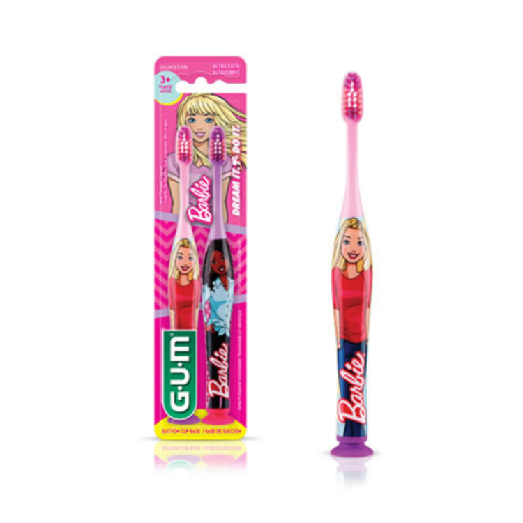 Two GUM Ultra Soft Barbie Twin Pack toothbrushes with colorful Barbie-themed handles for gentle cleaning.
