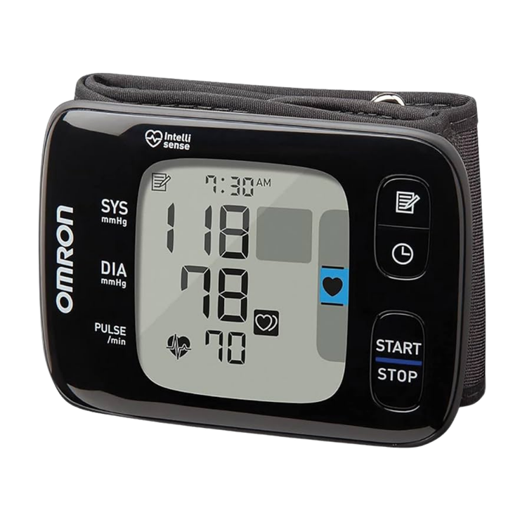 Omron blood pressure monitor wrist device, compact and digital, used for at-home blood pressure measurement.