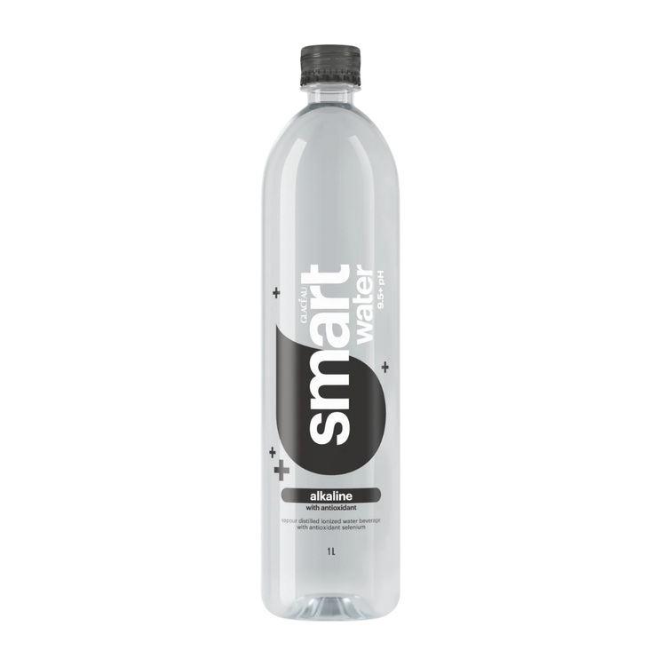 1L bottle of Glacéau Smartwater Alkaline pH 9+ from Farmacias Savia, clear plastic bottle with blue cap and label.