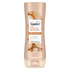 Suave Keratin Infusion Smoothing Conditioner for hair, 12.6 oz, with a bottle showing the product label and cap.