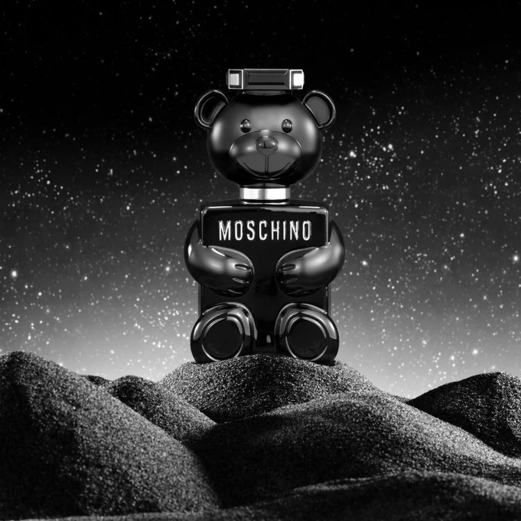Moschino Toy Boy Eau de Parfum for Men, 3.4oz bottle with playful toy-inspired design, displayed in the image.