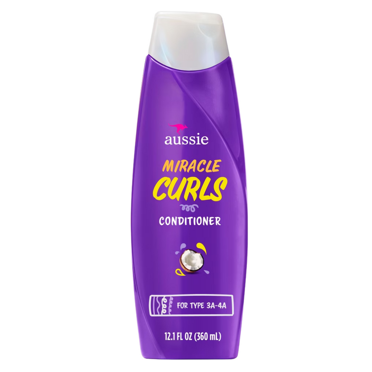 Aussie Miracle Curls Conditioner bottle for curly hair, 12.1 oz, with vibrant label featuring product branding and design.
