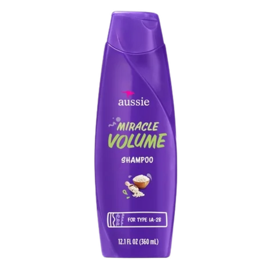 Aussie Miracle Volume Shampoo bottle from Farmacias Savia, 12.1 oz, featuring vibrant pink and purple packaging for voluminous hair