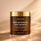 Pure Batana Hair Growth Paste by Maree shown in a jar, highlighting its natural, herbal hair care product for promoting hair growth.