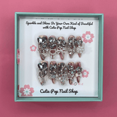 Press-on nails with sparkling rhinestone design, Bougie Bling 14 by Cutie Pop Nail Shop, showcasing glamorous nail art.