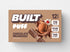 Built Chocolate Milkshake Puff, a soft, chocolate-flavored puff snack with a creamy milkshake taste and fluffy texture.