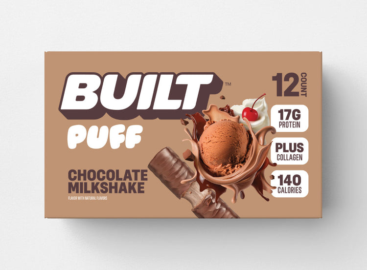 Built Chocolate Milkshake Puff, a soft, chocolate-flavored puff snack with a creamy milkshake taste and fluffy texture.