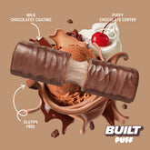 Built Chocolate Milkshake Puff stack showing textured, chocolate-flavored puff snacks with a creamy milkshake appearance.