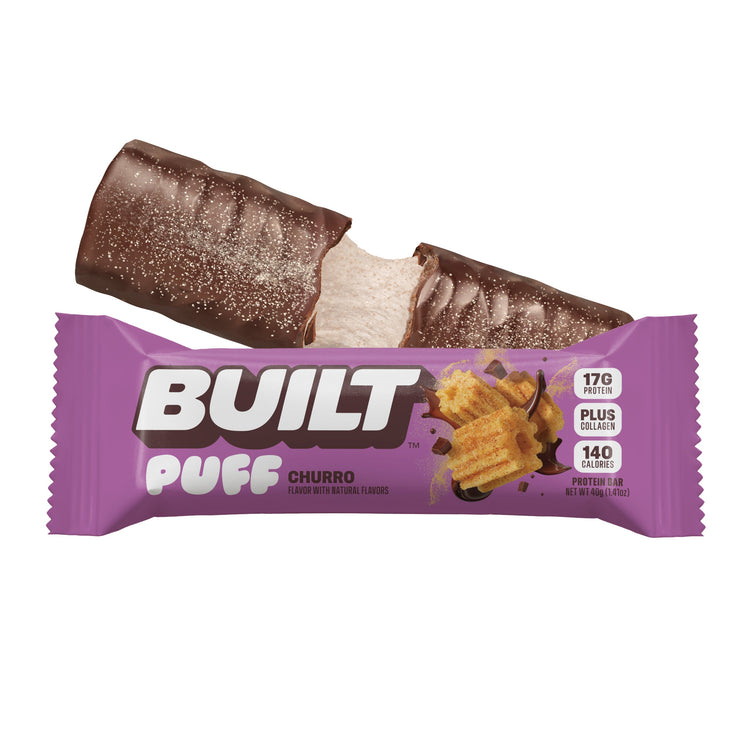 Stack of BUILT Churro Puffs with crispy, golden exterior and creamy filling in a natural presentation.