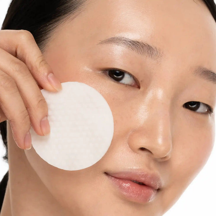 Maree collagen and retinol toner pads with textured surface for skincare, displayed on a neutral background.