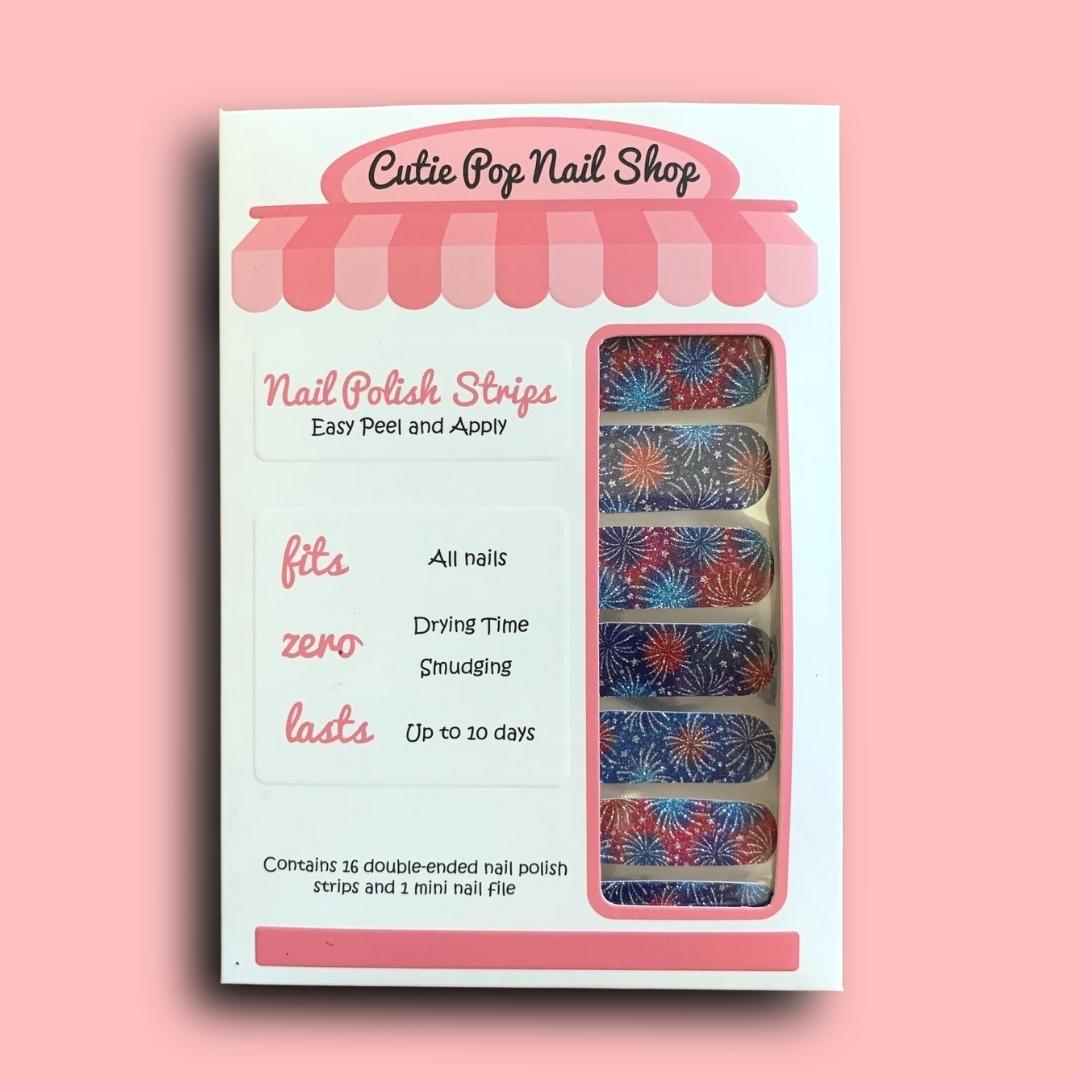 Colorful Cutie Pop Nail Shop fireworks nail strips with vibrant, festive designs for creative nail art.