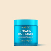 Maree keratin mask for damaged hair, deep conditioning treatment in a jar with a creamy texture and application spatula.