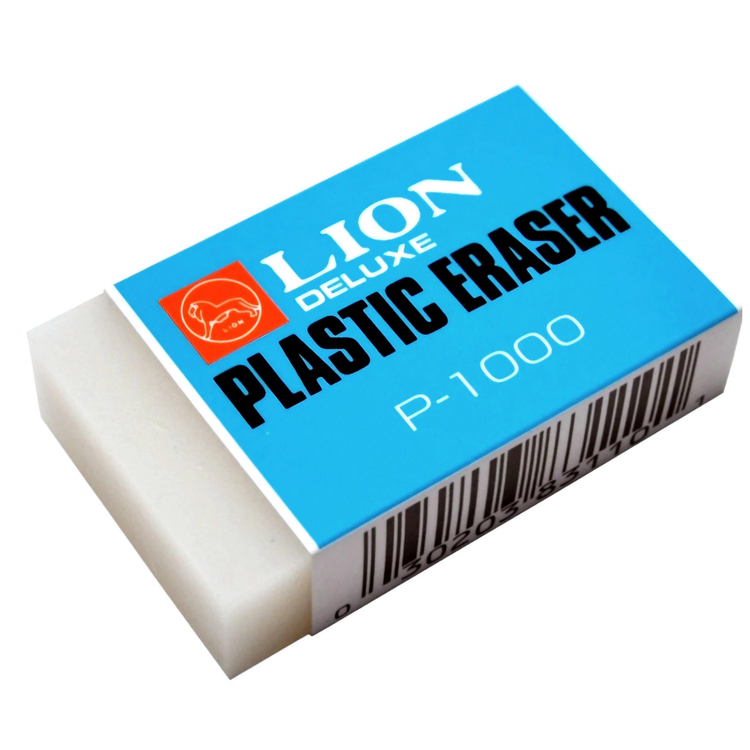 Plastic eraser LION Goma de Borrar Plástica Deluxe P-1000 from Farmacias Savia, shown next to other school supplies.