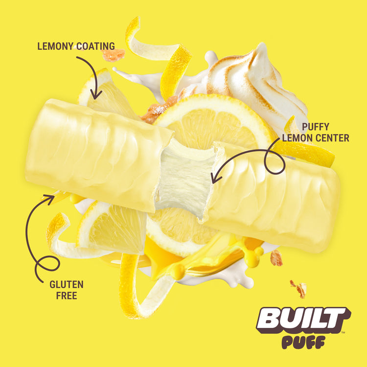 Stack of lemon meringue pie flavored puffs by BUILT, showcasing golden, flaky pastry with lemon cream and meringue topping.
