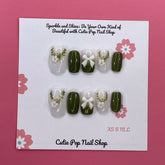 Elegant olive green press-on nails by Cutie Pop Nail Shop, showcasing a stylish and glossy nail design.