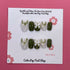 Elegant olive green press-on nails by Cutie Pop Nail Shop, showcasing a stylish and glossy nail design.