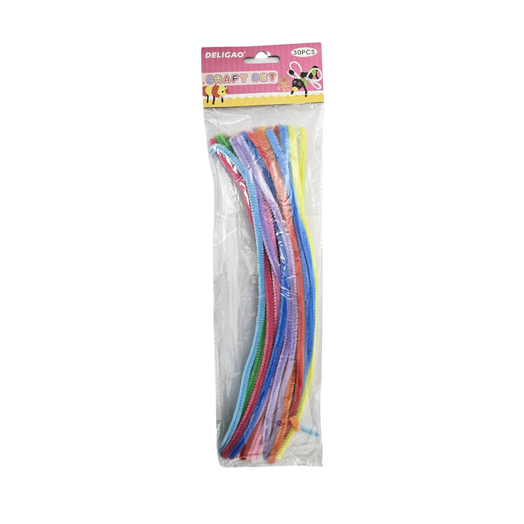 Assorted school craft supplies including colorful paper, scissors, and glue for children&