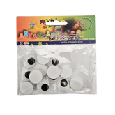 Assorted school craft supplies including colored paper, glue, and scissors from Farmacias Savia for children&