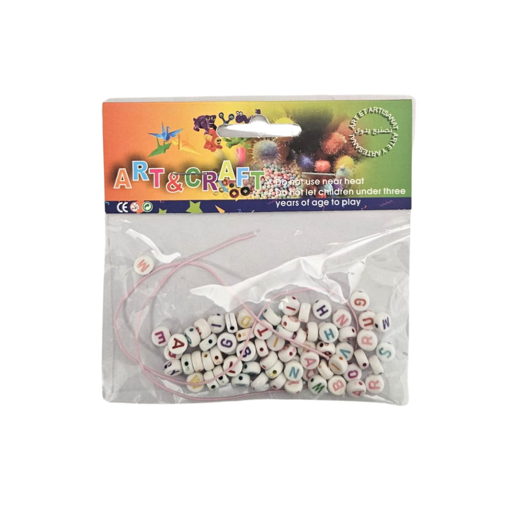 Assorted school craft supplies including colored paper, scissors, and markers for children&