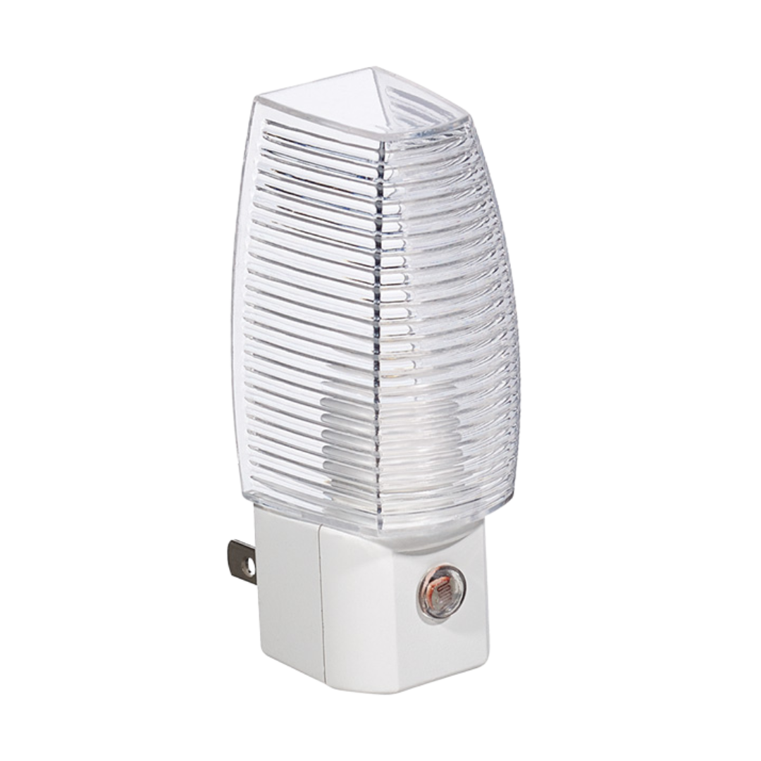 Plug-in night light from Farmacias Savia, compact and easy to use, providing soft illumination for bedrooms or hallways.