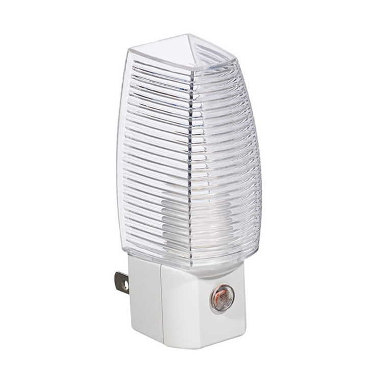 Plug-in night light from Farmacias Savia, compact and easy to use, providing soft illumination for bedrooms or hallways.